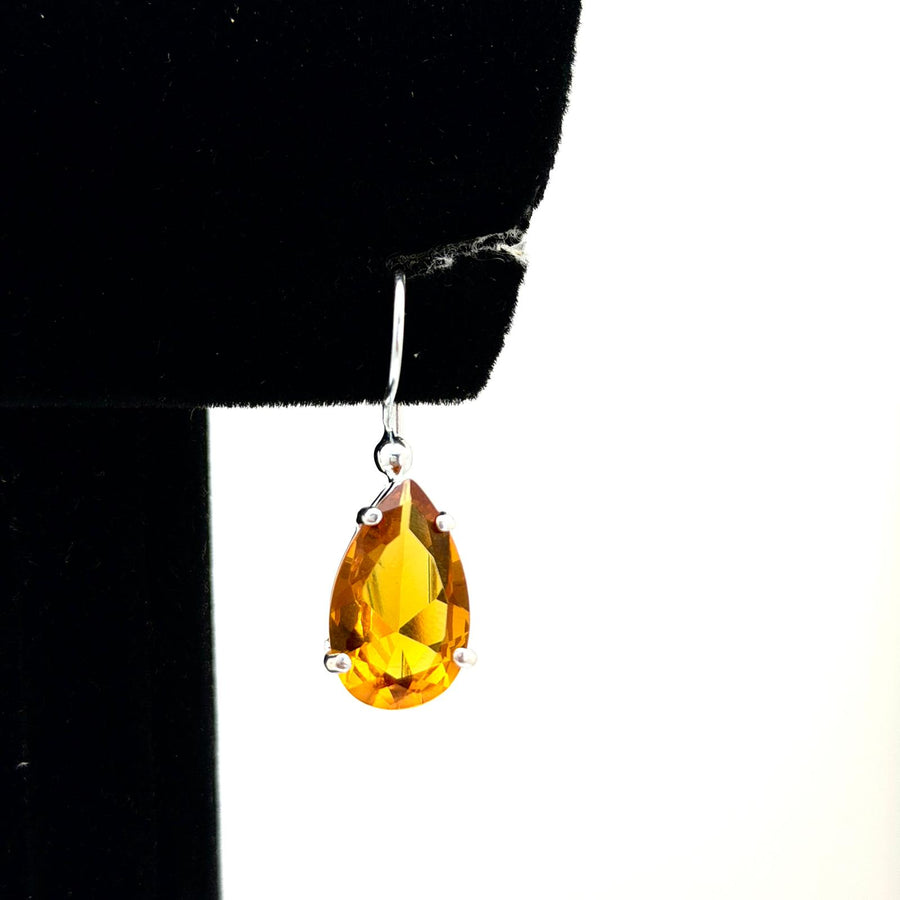 Silver earrings with pear shape stone